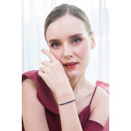 B. BRILLIANT Sterling Silver 5x3mm Created Blue Sapphire Oval-Cut Bolo Pull-string Adjustable Tennis Bracelet