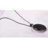 Long chain 'Frieda', 2 Polaris cabochons in a double-sided black