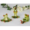 Decorative frog figure sitting in yoga posture, 1 of 3