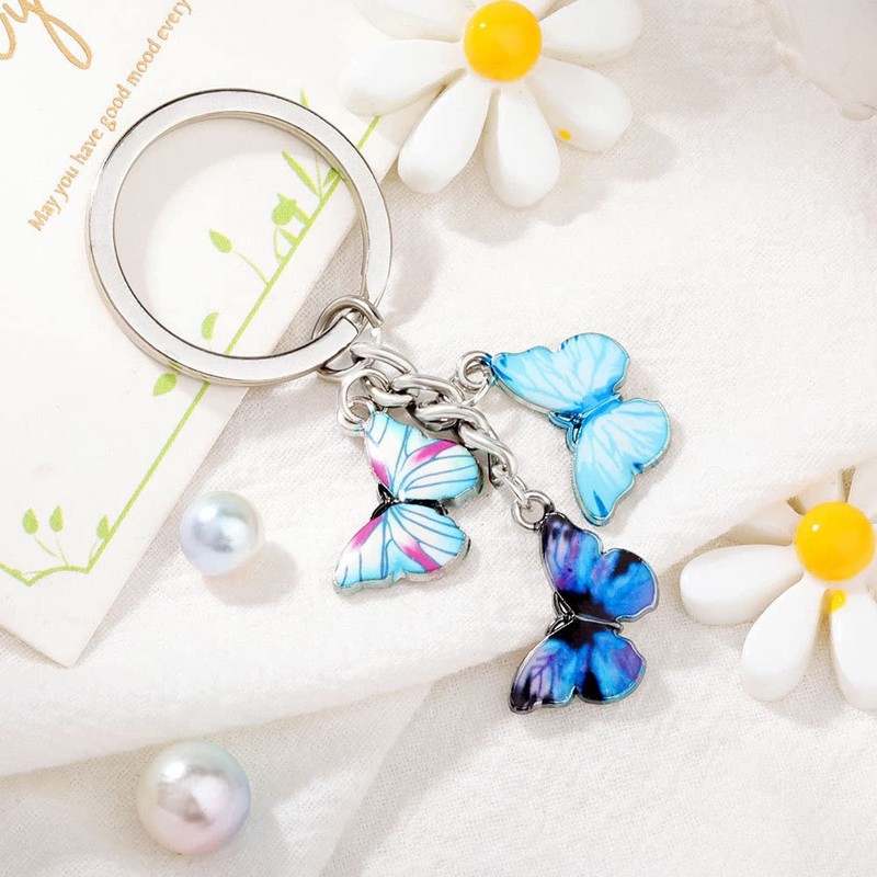Meimimix Llavero de mariposa esmaltada con borla para mujeres y