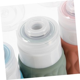 WOONEKY 4pcs Travel Bottles for Toiletries Includes Cherry Blossom with Storage Bag Leakproof Travel Shampoo Conditioner Containers