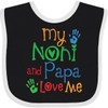 inktastic Noni and Papa Love Me Baby Bib Black and