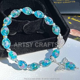 ARTSY CRAFTS INC Oval Shaped Glow in the Dark Firefly Bead Bracelets, Butterfly Charm Rose Flower Beaded Bracelet Luminous Murano Jewelry, Gifts for Birthday Valentines (Blue 6-7")