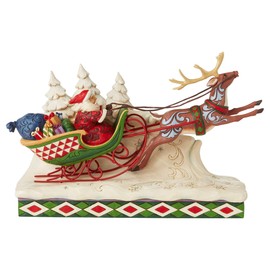Enesco Jim Shore Heartwood Creek Here Comes Santa Sleigh with Reindeer Figurine, 7-Inch Height, Multicolor