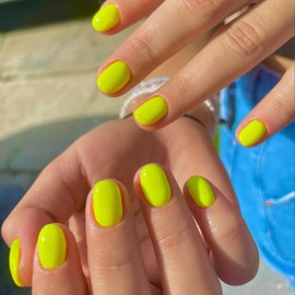 Short Press on Nails Almond Shape Fake Nails RIICFDD Oval Round False Nails Oval Nails Press on Pure Color Designs Artificial Glossy Full Cover Acrylic Nails for Women Nail Decor 24 Pcs (Light Yellow)