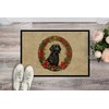 Caroline's Treasures DAC2365JMAT Flat-Coated Retriever Christmas Flowers Doormat Front Door
