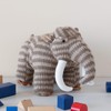 Knitted Brown Woolly Mammoth Dinosaur Soft Toy. Suitable from Birth