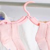 16 x Foldable Hangers with Non-Slip Surface in Four Colours,