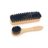 DELARA Two small wooden handled brushes made from natural bristles,