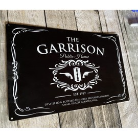 The Garrison public house black metal pub bar wall sign