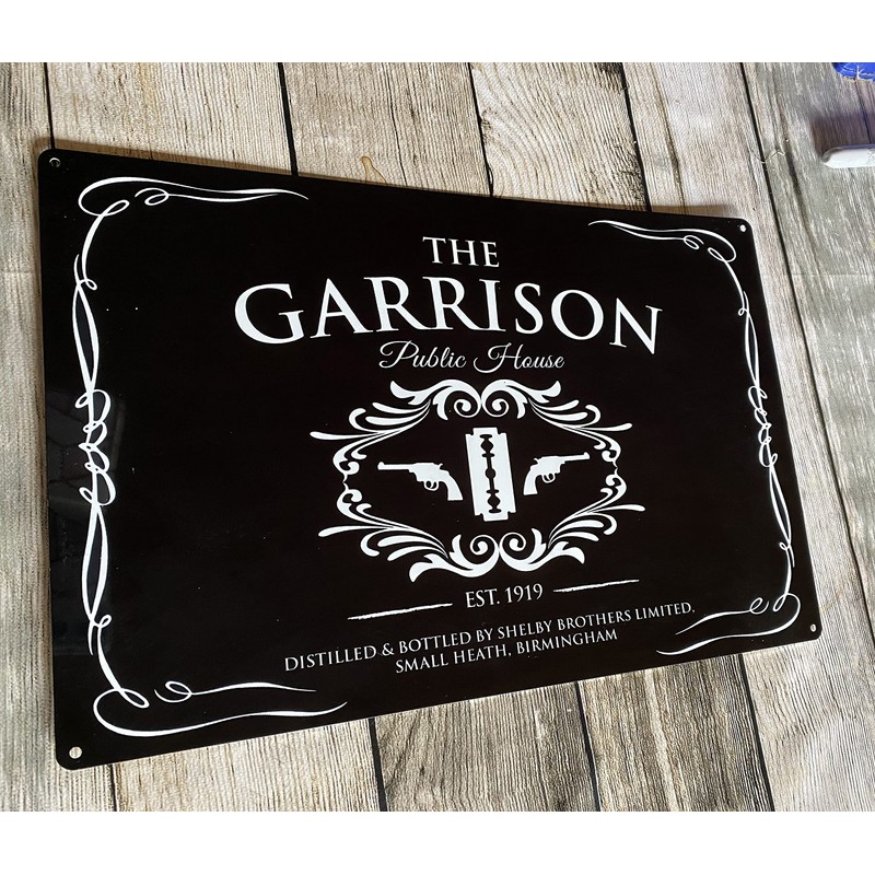 The Garrison public house black metal pub bar wall sign