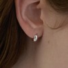 A pair of 925 silver bold one-touch ring earrings /