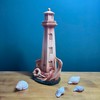 Handcrafted Wood-Effect Lighthouse: 22cm Height, Intricate Carving, Adorned with Whale