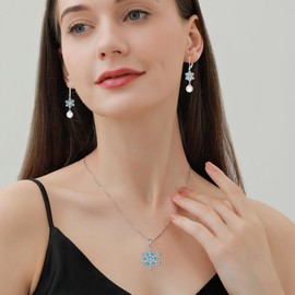 Oskani Snowflake Necklace for Women 925 Sterling Silver 5A Cubic Zirconia March Birthstone Aquamarine Color Pendant Necklace Jewelry Winter Christmas Birthday Presents for Her