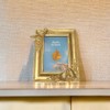 Willump A picture frame: 10.2 x 15.3 cm, jewellery with