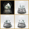 Snow globe mountain landscape with bridge, pewter effect ornaments, with