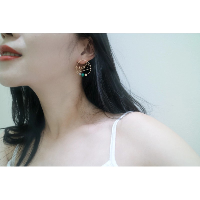 Cachito Studio Custom Word Earrings in 14k Gold w. Peacock