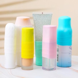 Tyqour 10 Pack Silicone Bottle Covers Leak Proof Travel Bottle Covers Silicone Covers for Travel Toiletries Elastic Sleeves for Leak Proofing Fits Various Travel Size Bottles