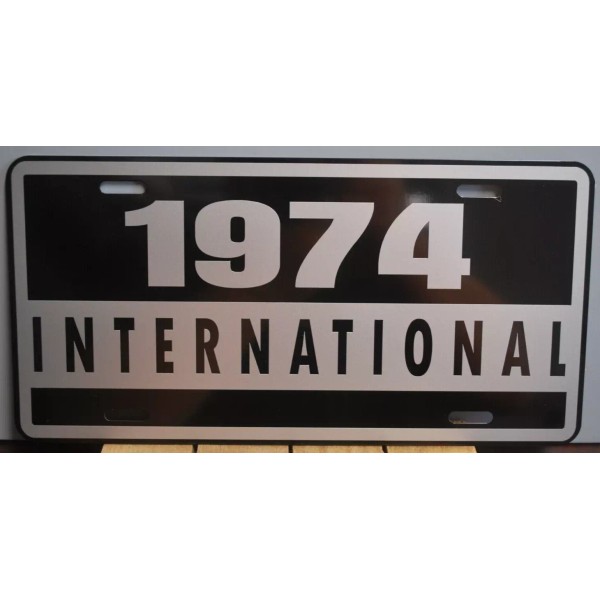 METAL LICENSE PLATE TAG 1974 INTERNATIONAL FITS SCOUT TRAVELALL TRAVELER