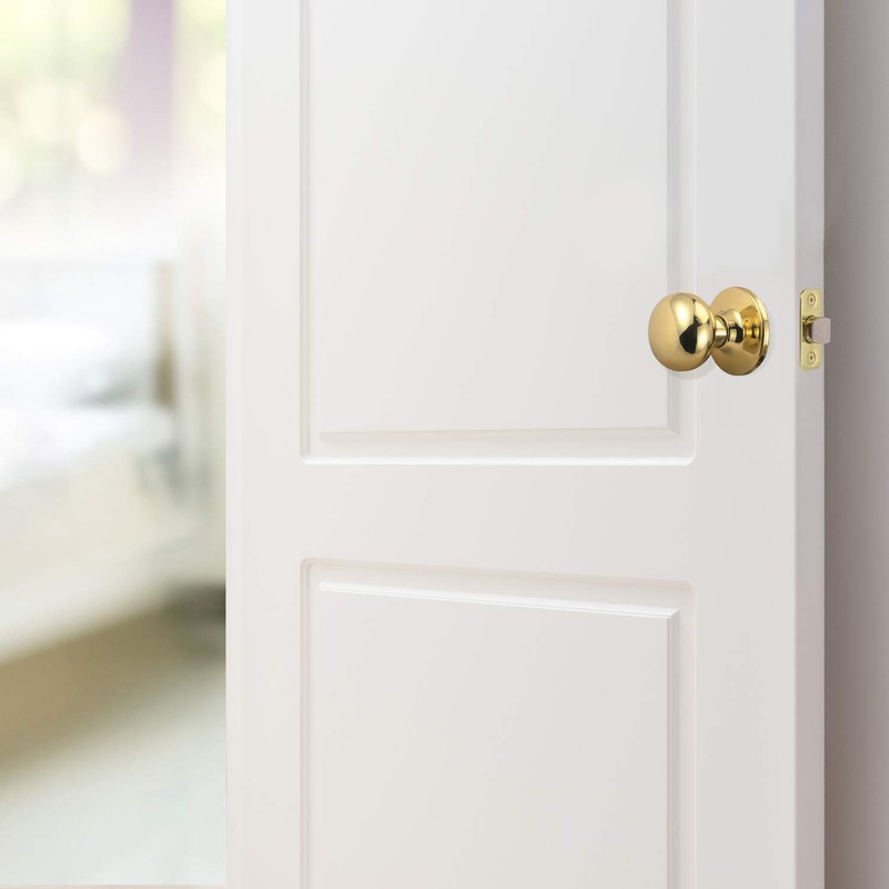Design House 753269 Cambridge 2-Way Latch Passage Door Knob, Polished