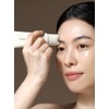 Marcique Wrinkle Repair Gua Sha Essence 45ml - Applying gua