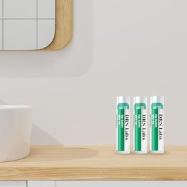 Bálsamo labial con protección solar mineral FPS 15 Vegano y libre de crueldad animal Amplio espectro UVA/UVB Aroma a limón y menta Para hidratación y protección solar de DRN Labs. 0,15 oz