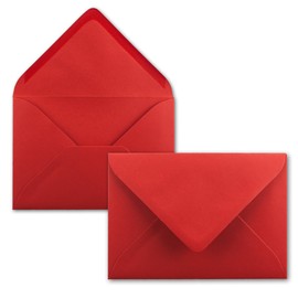 C7 envelopes, pointed flap, wet glue.