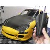 VViViD XPO Black Carbon Fiber Car Wrap Vinyl Roll Featuring