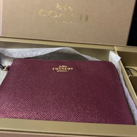 COACH STAR GLITTER BLACK CHERRY WRISTLET W/2 CHARMS