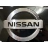 Nissan Embossed Auto License Plate. Black & Silver Aluminum Plate