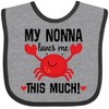 inktastic Nonna Loves Me Grandson Baby Bib Heather and Black