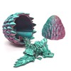 Generic 3D Printed Dragon Egg and Wings, Articulated Dragons Inside,