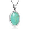 AeraVida Simply Elegant Oval Shaped Simulated Turquoise Inlay .925 Sterling