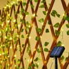 KAiSnova Solar Vine String Lights Outdoor, 33FT 100LED Warm White