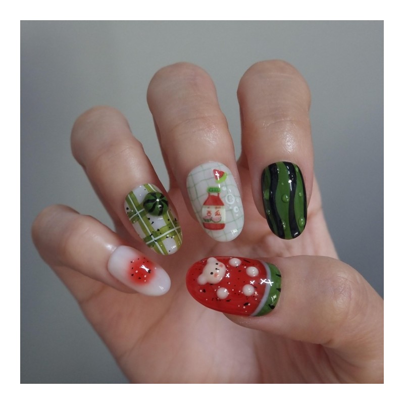 Handmade nail tip for a bear missing a watermelon in