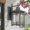 Jafinou Dusk to Dawn Outdoor Wall Sconce, Sand Black Exterior