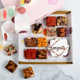Send Your Message with a Brownie Points "Congrats" Brownies Gift Box: Created with the Finest, Freshest ingredients, most Inventive Flavors and a Thank you BrowniEmoji. 13 Baked from Scratch Brownies, each Individually wrapped for peak freshness and share-ability.