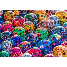Springbok's Sugar Skulls 1000 Piece Jigsaw Puzzle for Adults is an Amazing Colorful Display of Painted Skulls or Calaveras - traditional Mexican Folk Art.