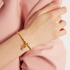 Free bird Gold Bracelets for Women non tarnish 14K Gold Plated Beaded Bracelets with Gold Birthstone Cross Charm Stretch Bracelet Birthstone Stacking Bracelets Gifts for Best Friends