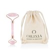 Rose quartz face roller with rose gold metal, featuring a