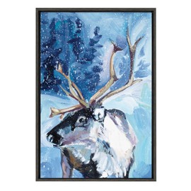 Kate and Laurel Sylvie Reindeer In Snow Framed Canvas Wall Art by Rachel Christopoulos; 23x33 Gray; Winter Christmas Reindeer Art for Wall