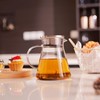CNGLASS 40oz/1200ml Glass Teapot Stovetop Safe,One-Touch Clear Tea Kettle,Blooming and