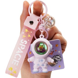 YOU WIZV Astronaut Keychain, Cute Kawaii Anime Cool Keychains for Backpacks, Space Keychains with Sunset Light for Women Men Boys Girls(Pink)