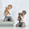 uxiro-turi- Statue Kindness (boy) Kindness (