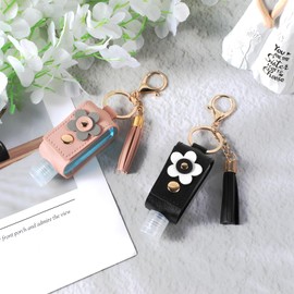 2 PCS Hand Sanitizer Holder Keychain PU Leather 1oz/30ml Refillable Hand Sanitizer Keychain Travel Size Portable Empty Travel Bottle Keychains Small Squeeze Bottle for Toiletry Shampoo (Black+pink)