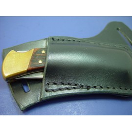 Black Buck 110 Right Hand Cross Draw Knife Sheath. The Sheath Is Made Out of 8 Oz. Leather Made to Wear on the Left Side and Drown on the Right Hand.