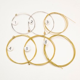 GZYUJIEMEDIA 6 Pieces Acoustic Guitar Strings Set (String Gauge 0.01-0.05),(10-50), Replacement Bronze Strings, Ideal for Beginners and Performers - (Color, Brass)