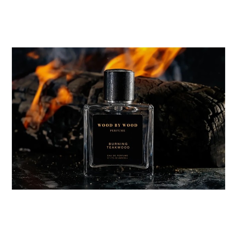 A burning bonfire, the scent of wet firewood.Burning Teakwood /