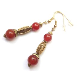 Thurcolas Ohrringe in golden metall in Karneol der Medicis Serie