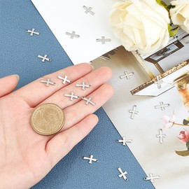 UNICRAFTALE 100pcs 12x7x1mm 304 Stainless Steel Cross Pendant Cross Charms Silver Metal Color Metal Charms Valance Necklace Parts Easter Jewelry Gift Accessory Parts Craft DIY Supplies